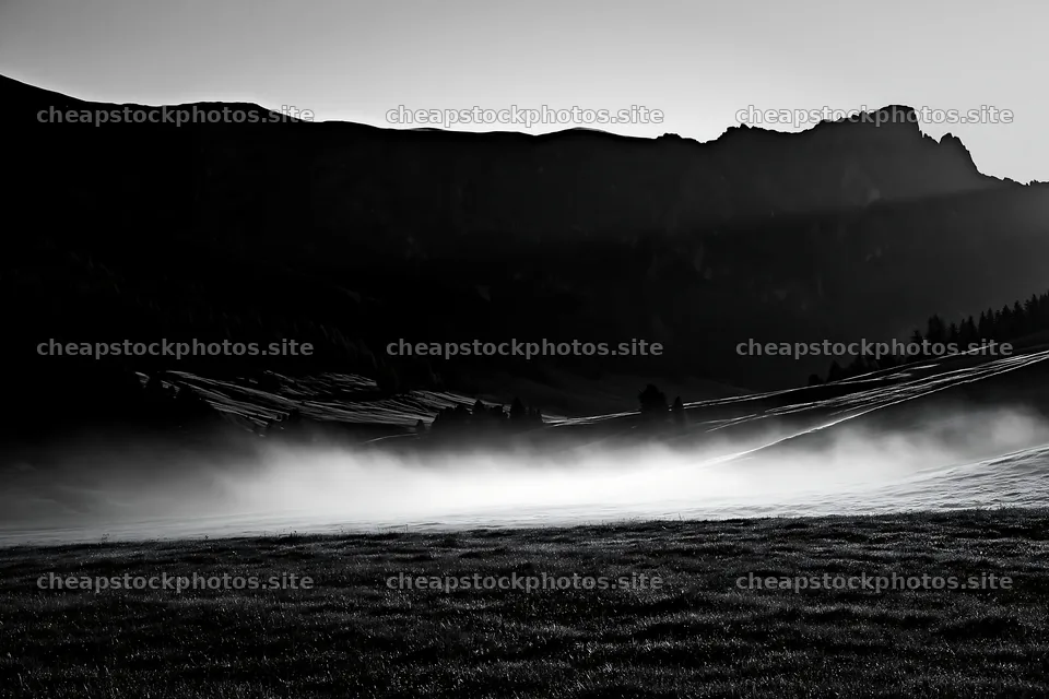 Alpe di Siusi meadow sunbeams create misty landscape – stock photos 9722x6480