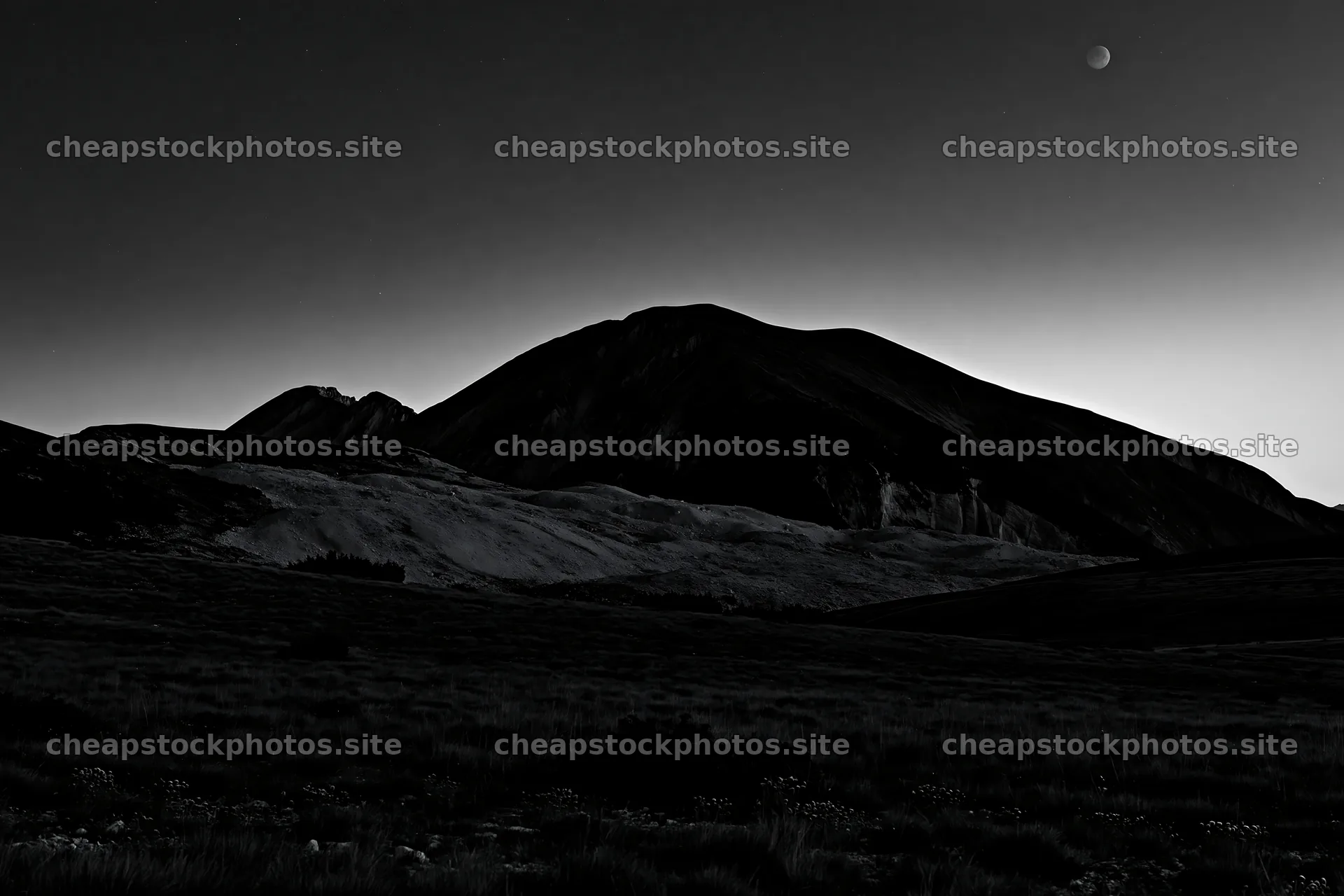 Moonrise over mountains in dark meadow – stock photos 9722x6480
