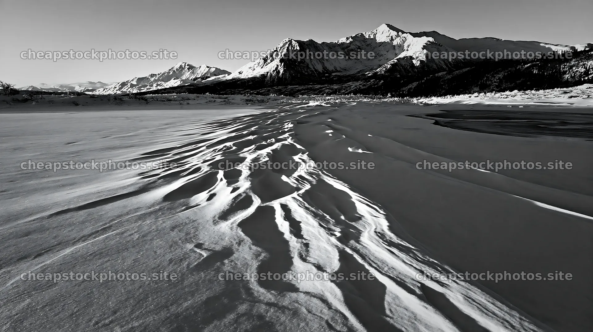 Snowbound meadow with mountains in winter landscape – stock photos 10608x5938