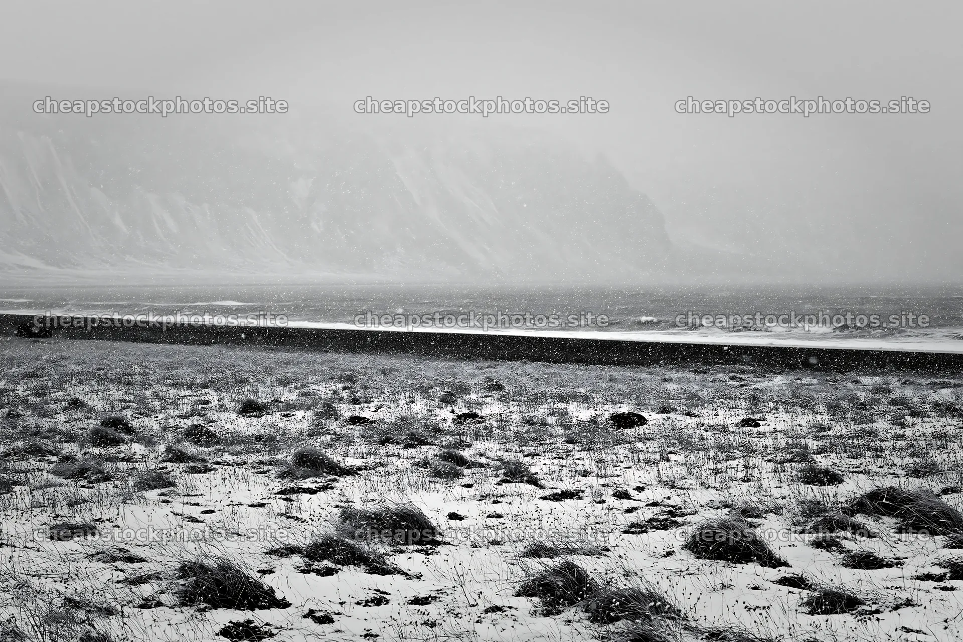 Snowy beach meadow with waves during winter weather – stock photos 9722x6480