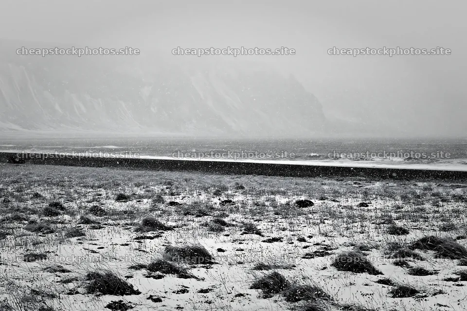 Snowy beach meadow with waves during winter weather – stock photos 9722x6480