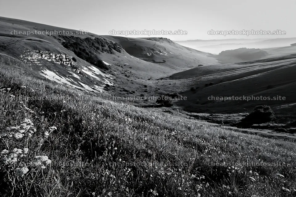 Chalk meadow with rolling hills under sunny sky – stock photos 9722x6480