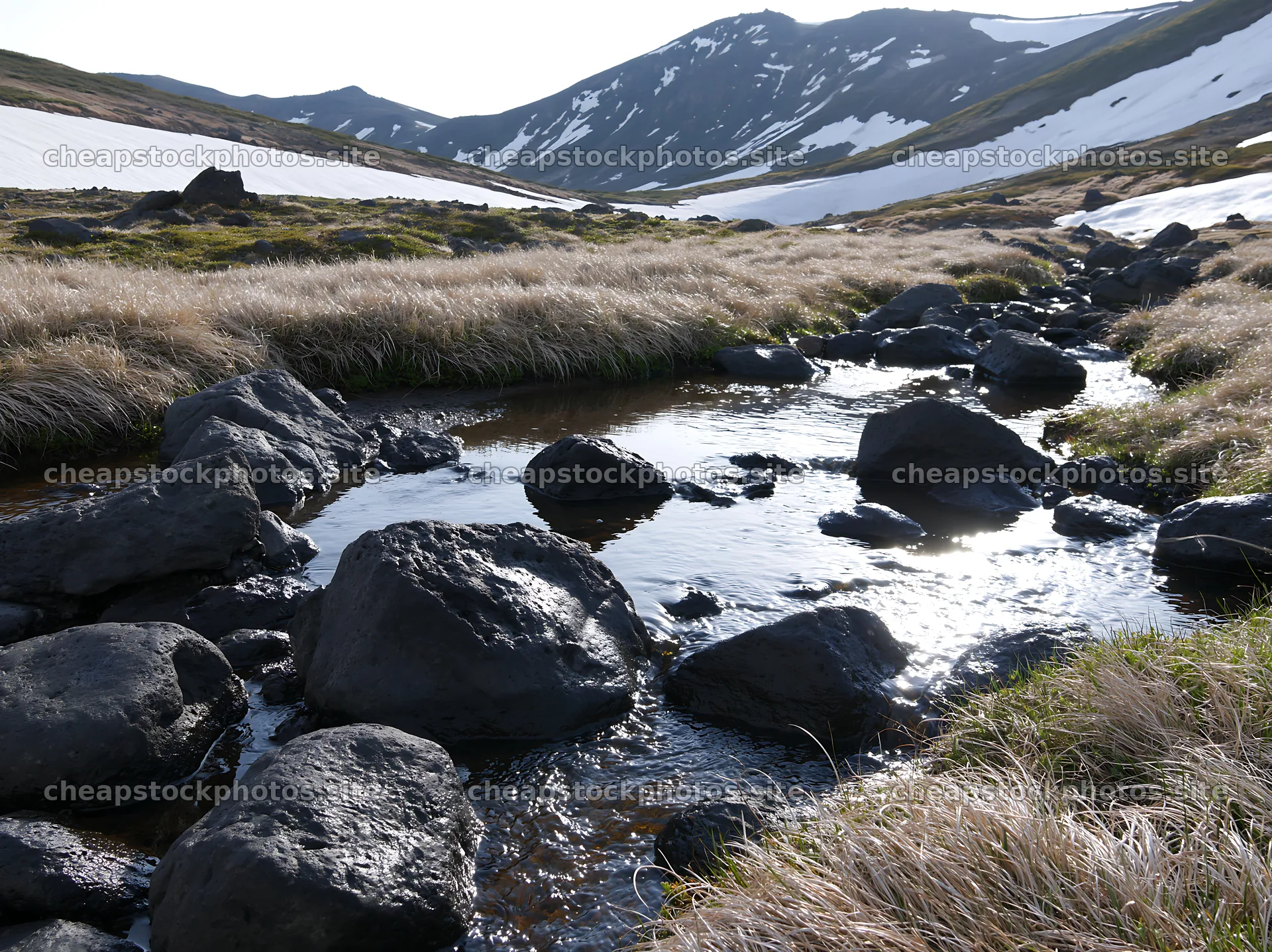 Akita snowmelt meadow with silver grasses and flowing stream – stock photos 9174x6866