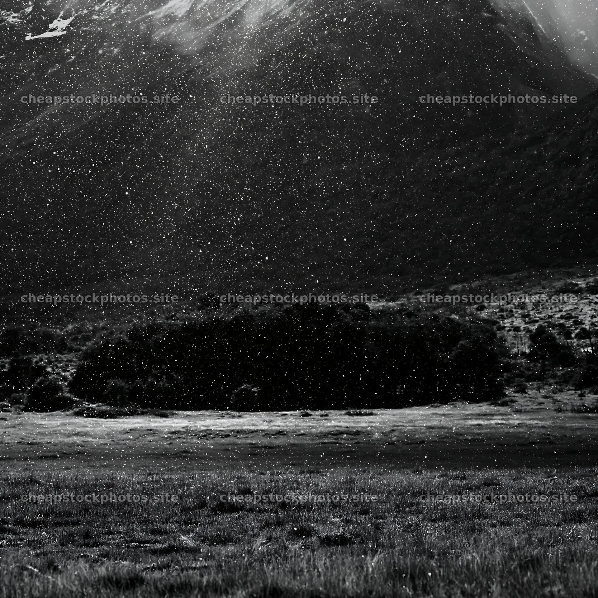Snow falling on Torres del Paine meadow with mountains in background – stock photos 7938x7938