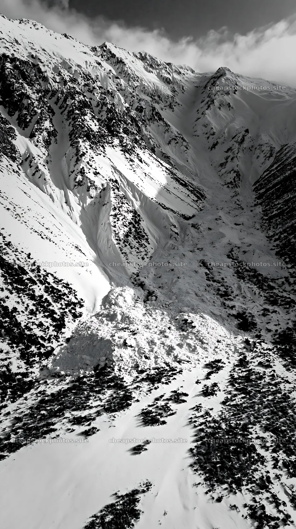 Aerial view of snowy meadow valley in winter landscape – stock photos 5938x10608