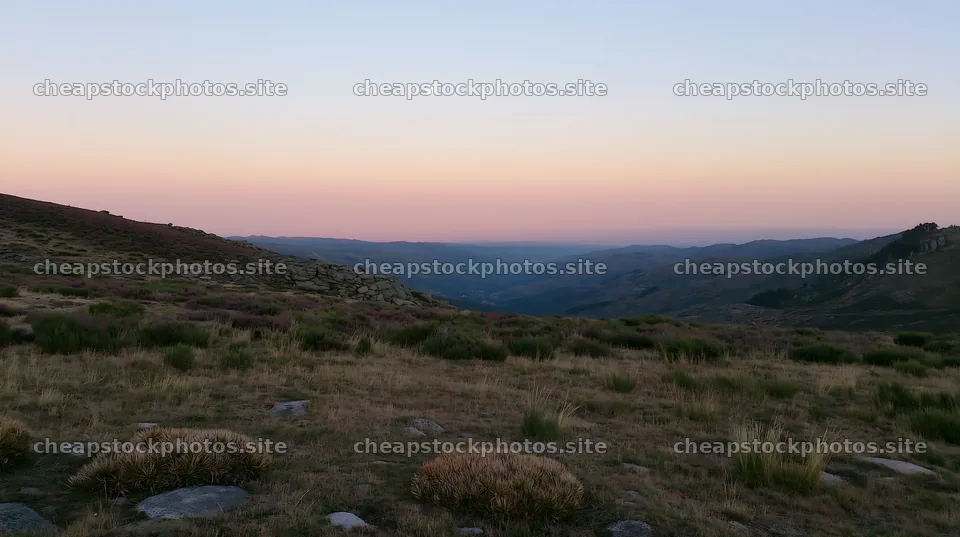 Moonrise over a meadow in a mountainous valley – stock photos 10608x5938