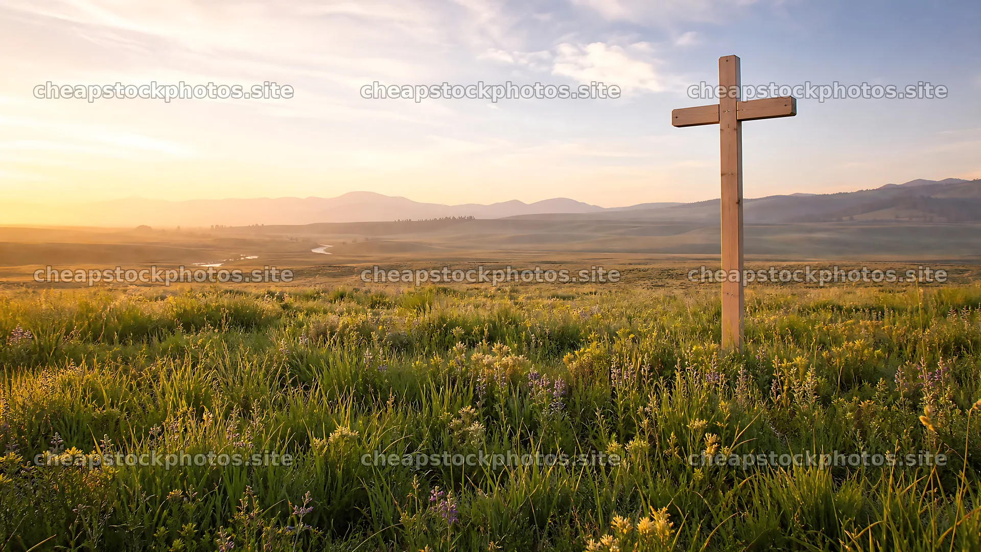 Wooden Christian cross in a meadow at sunrise – stock photos 10584x5952